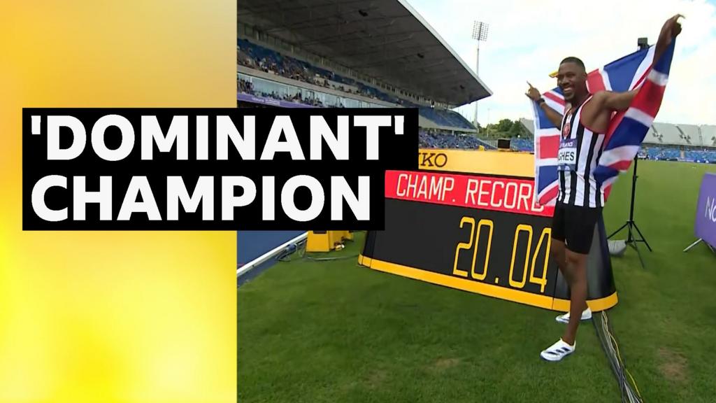 Hughes wins 200m with championship record