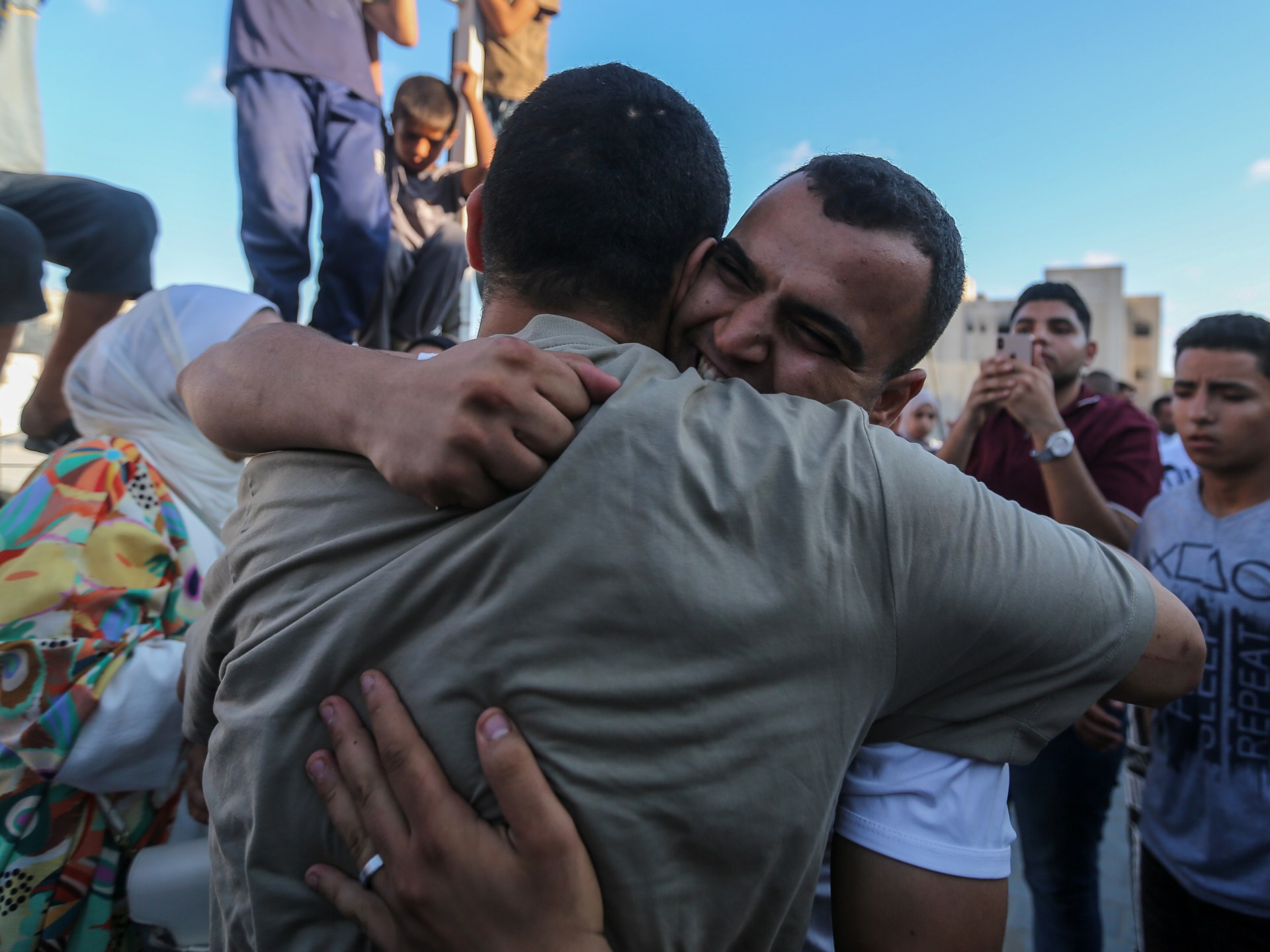 Sixty Palestinians detained by Israel return to Gaza, describe abuses