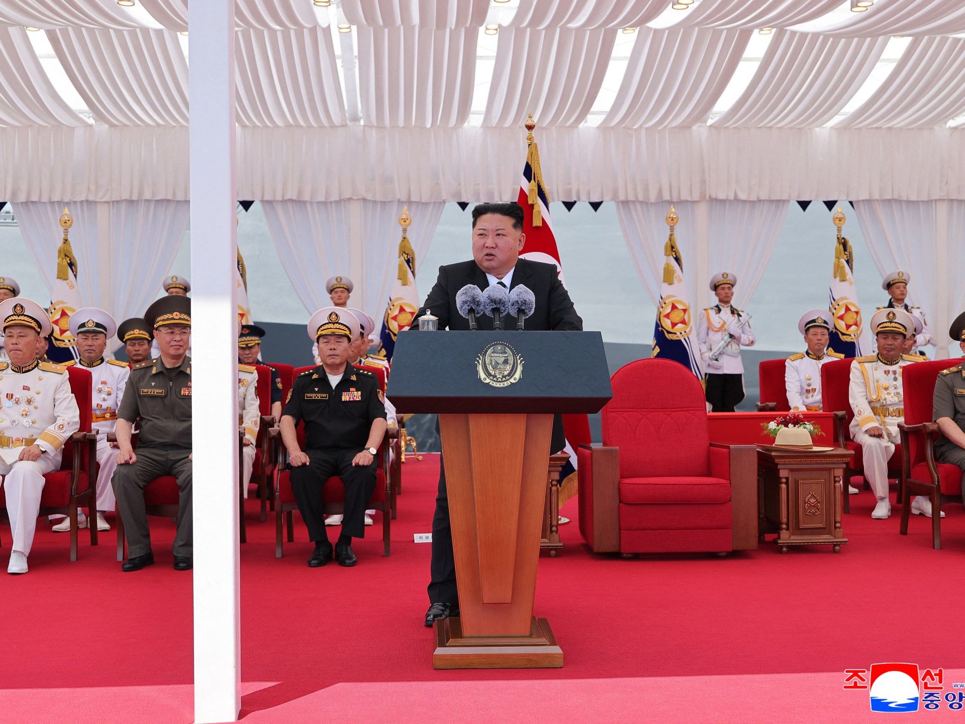 North Korea commissions warship as Kim eyes nuclear navy