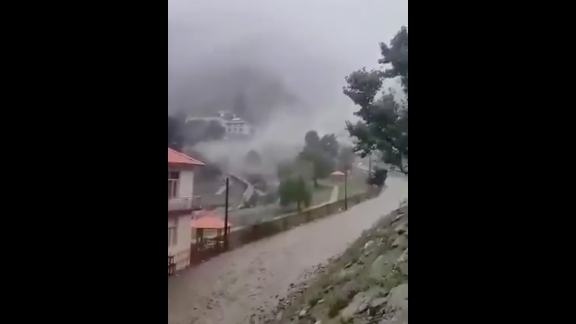 Moment terrifying floodwaters sweep through Afghan village