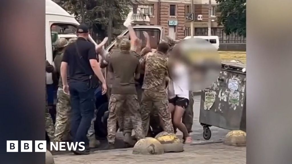 Why are Ukraine's military recruiters facing violence in their own country?