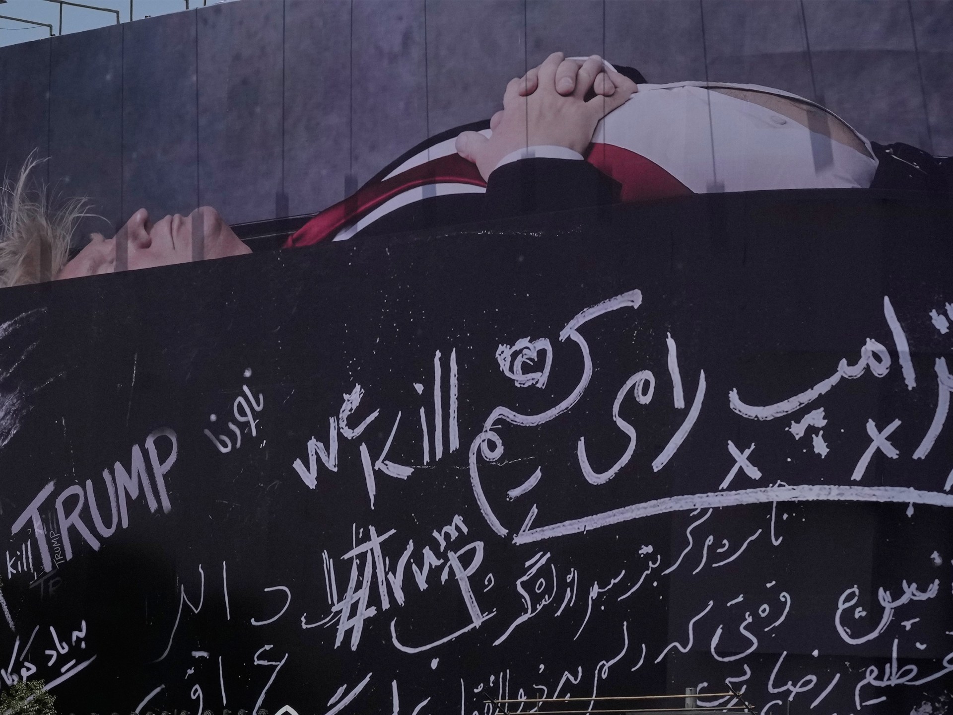 Iran unveils huge billboard showing Trump in coffin