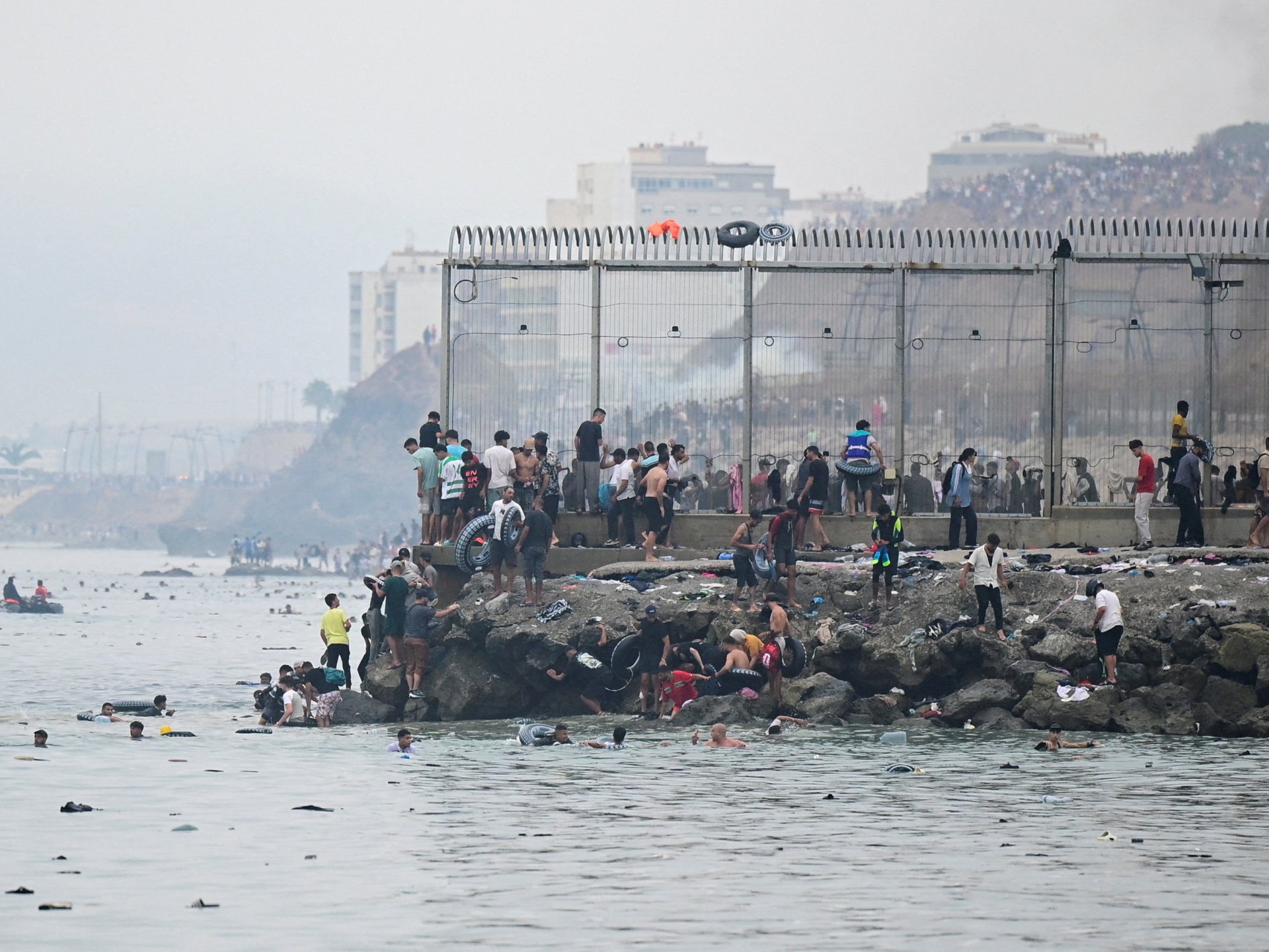 Spain PM to visit Ceuta after 19 migrants die breaching border from Morocco