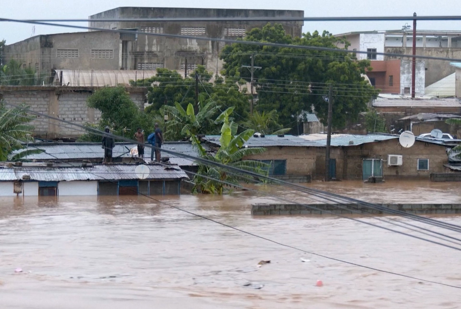 Fire and floods hit Ghana’s capital as residents are left stranded