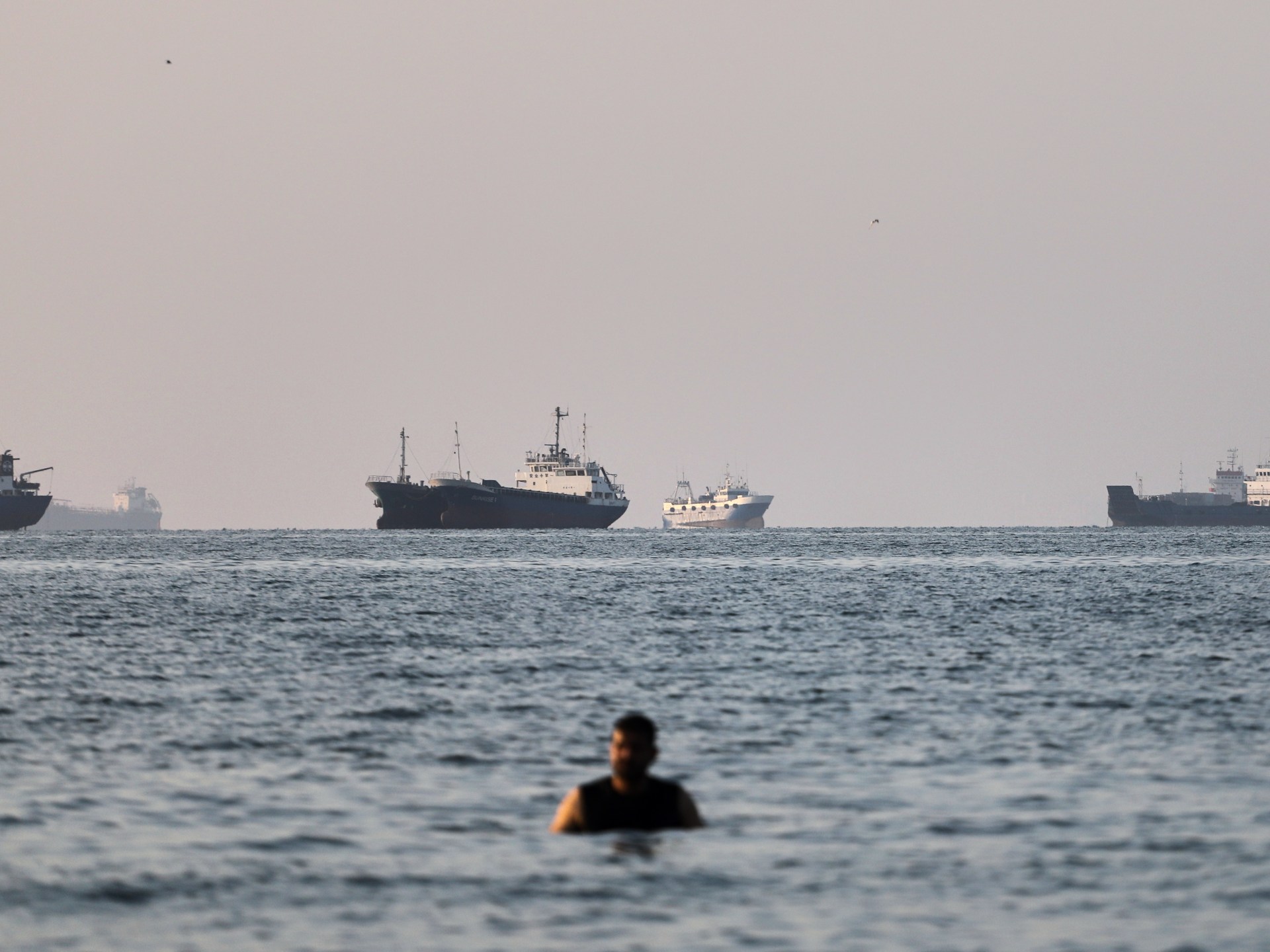 Tanker on fire off coast of Oman after being hit by projectile