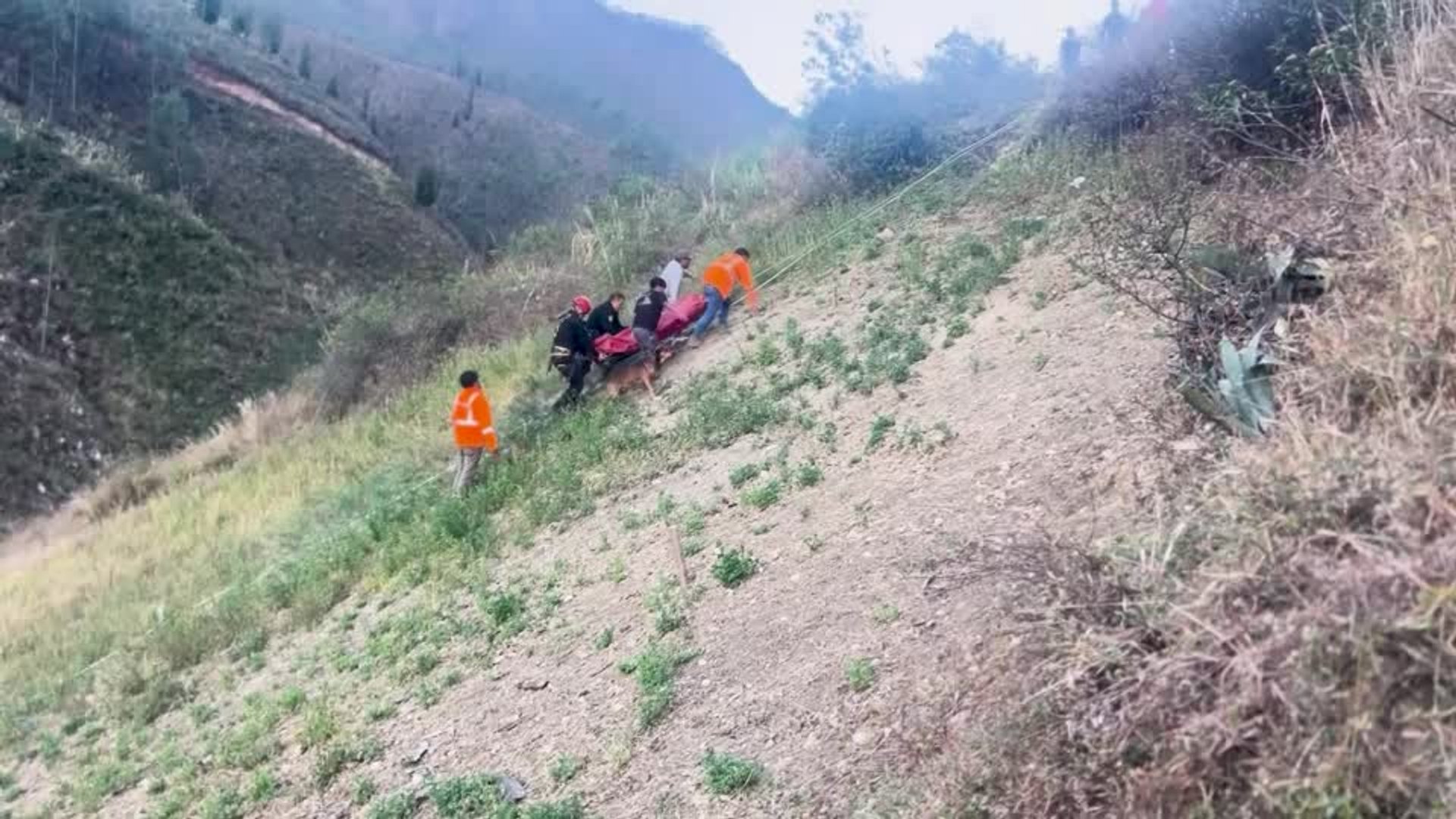 At least 14 dead after minibus rolls off mountain road in Peru