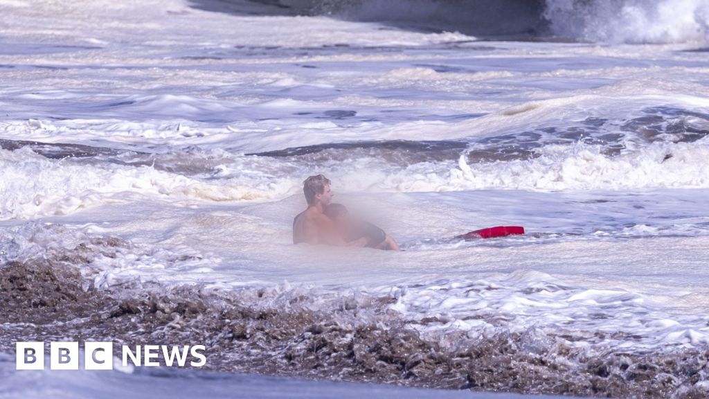 Bystander video shows teen lifeguard's dramatic ocean rescue