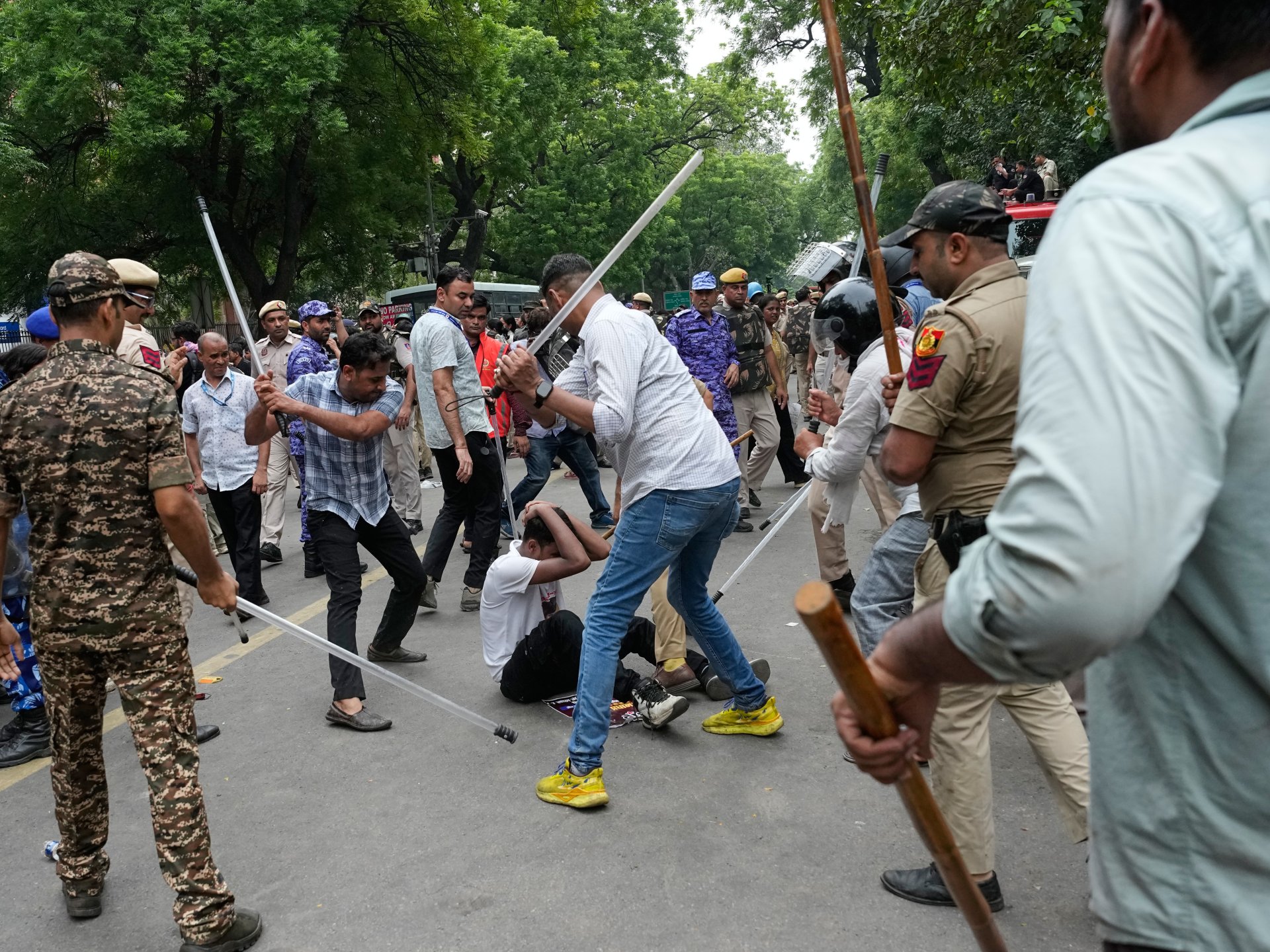 Photos: Police fire tear gas at India’s Cockroach movement supporters