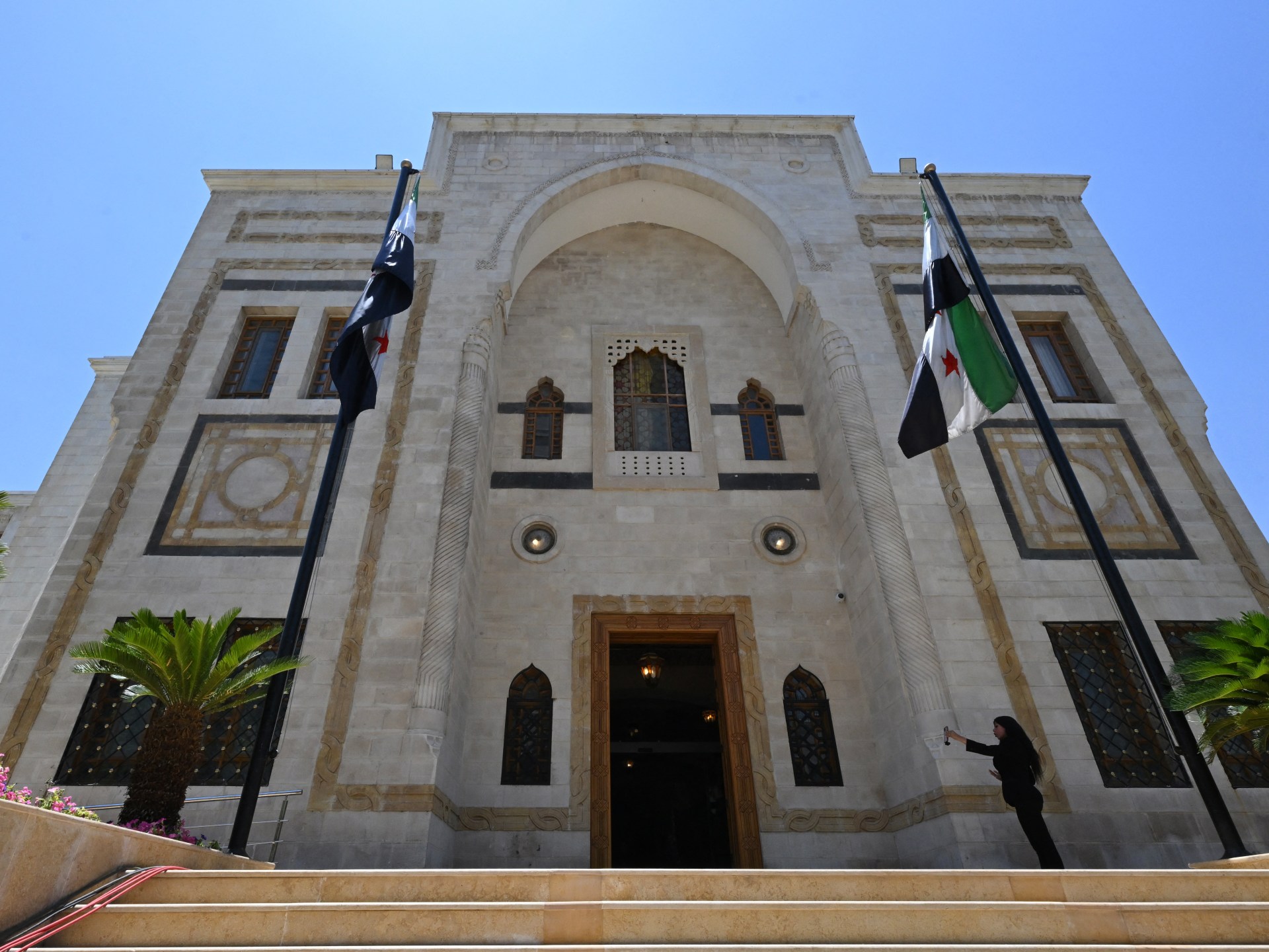 Syria delays first session of transitional parliament without explanation