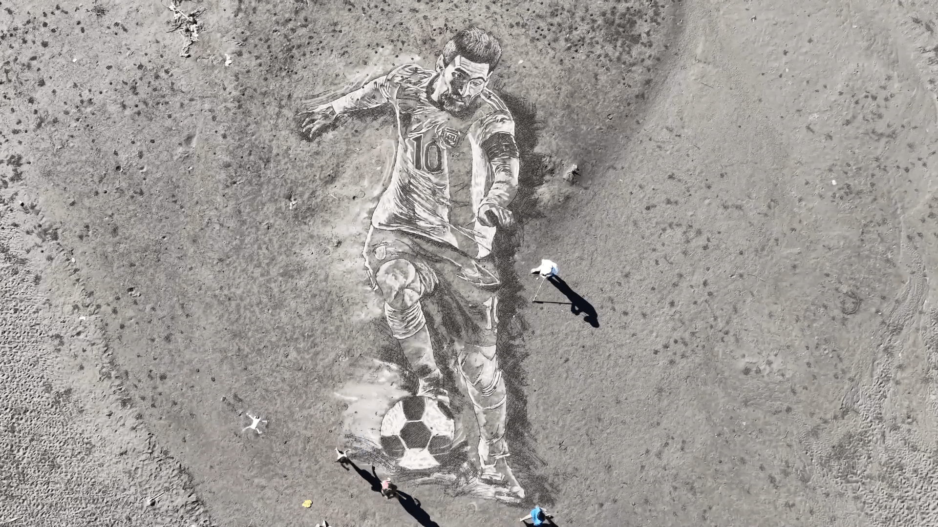 Giant Messi portrait carved into a Philippine beach for the World Cup