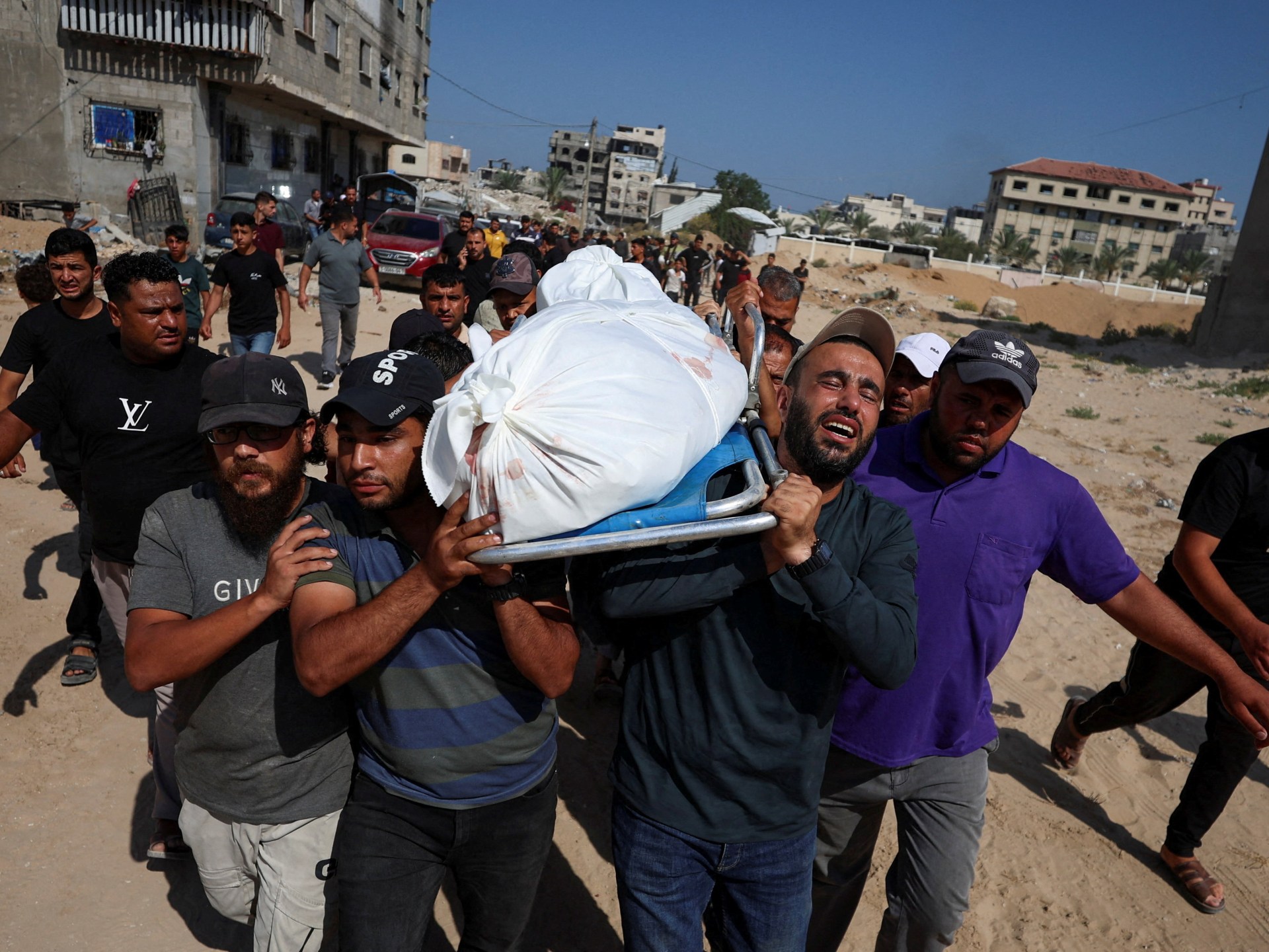 Iran war live: Khamenei’s body arrives in Qom; Hamas cedes Gaza governance