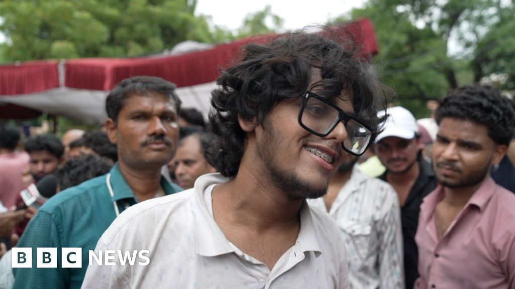 Protesters celebrate resignation of India's education minister