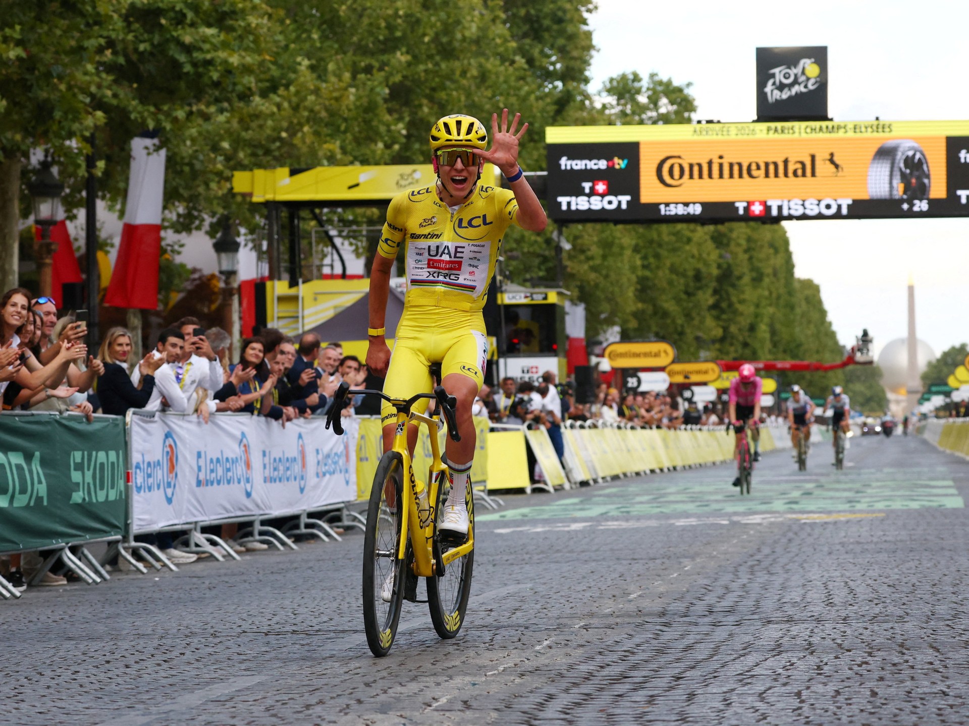 Tadej Pogacar wins Tour de France for a record-equalling fifth time