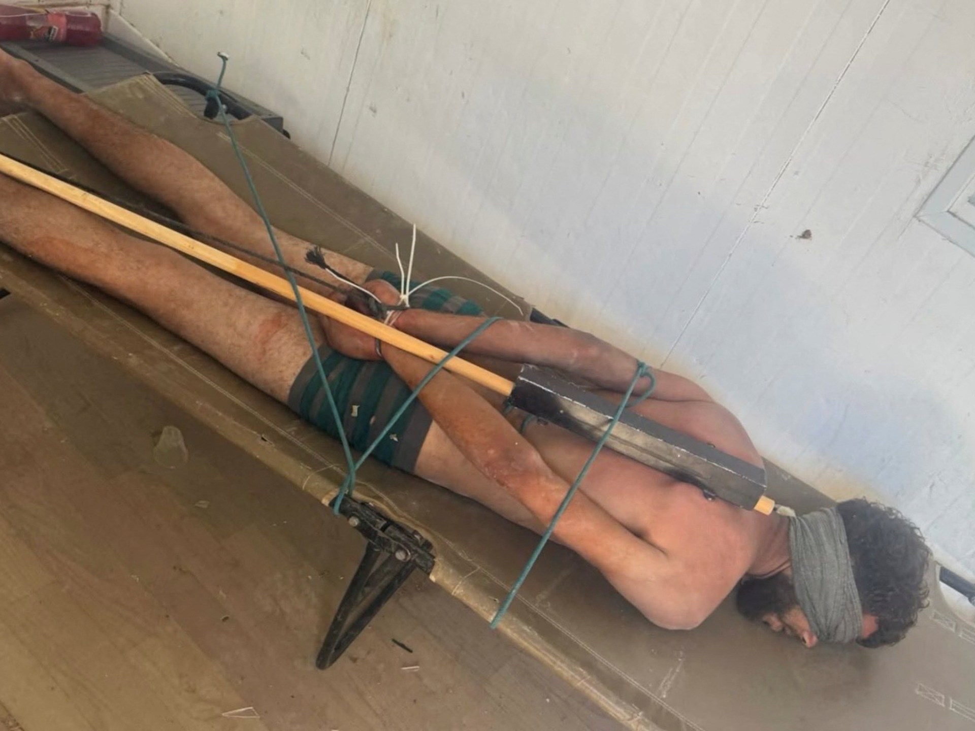 Photo of abused Palestinian detainee causes anguish for two Gaza mothers
