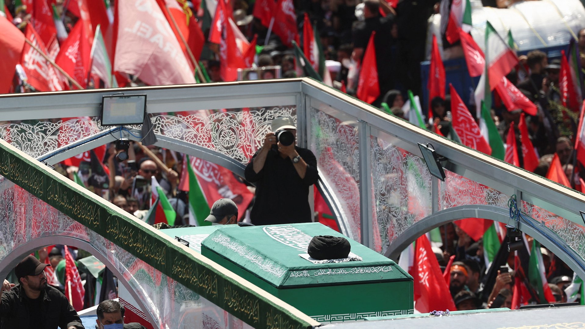 Khamenei’s funeral procession moves through Tehran