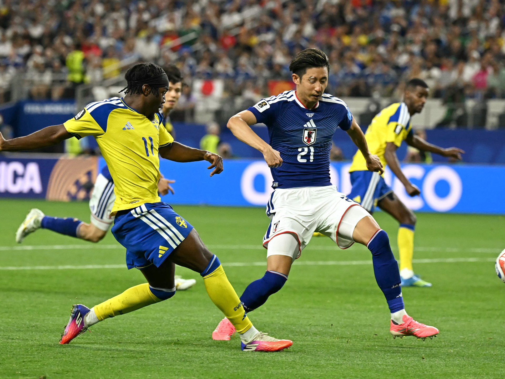 Japan draw 1-1 with Sweden at World Cup to finish second in Group F