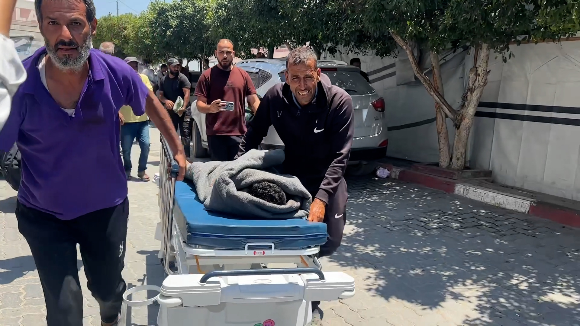 Palestinian boy amongst dead in Israeli strike on displaced tent in Gaza