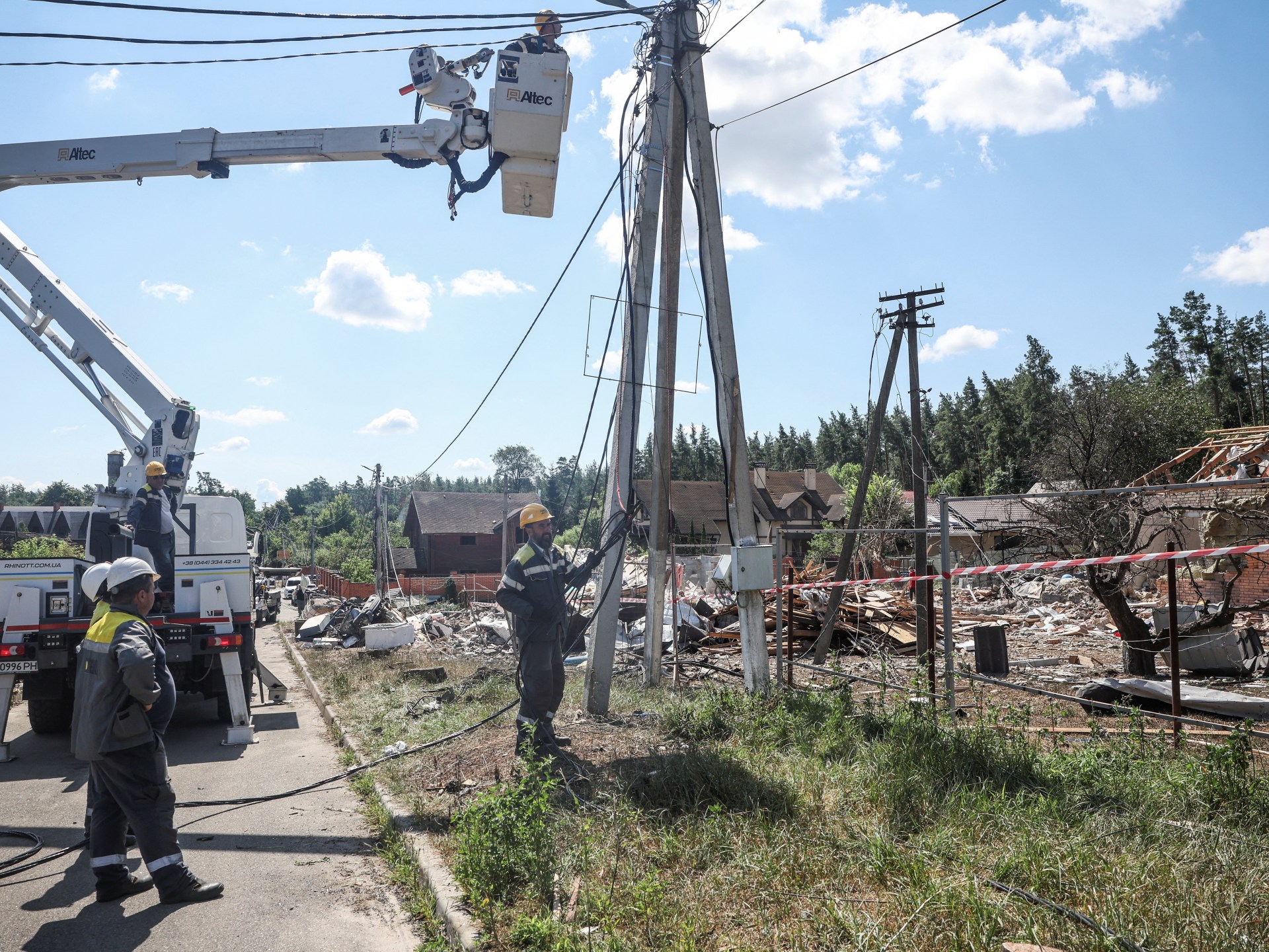 At least 11 killed in Ukrainian and Russian strikes as holiday camp hit