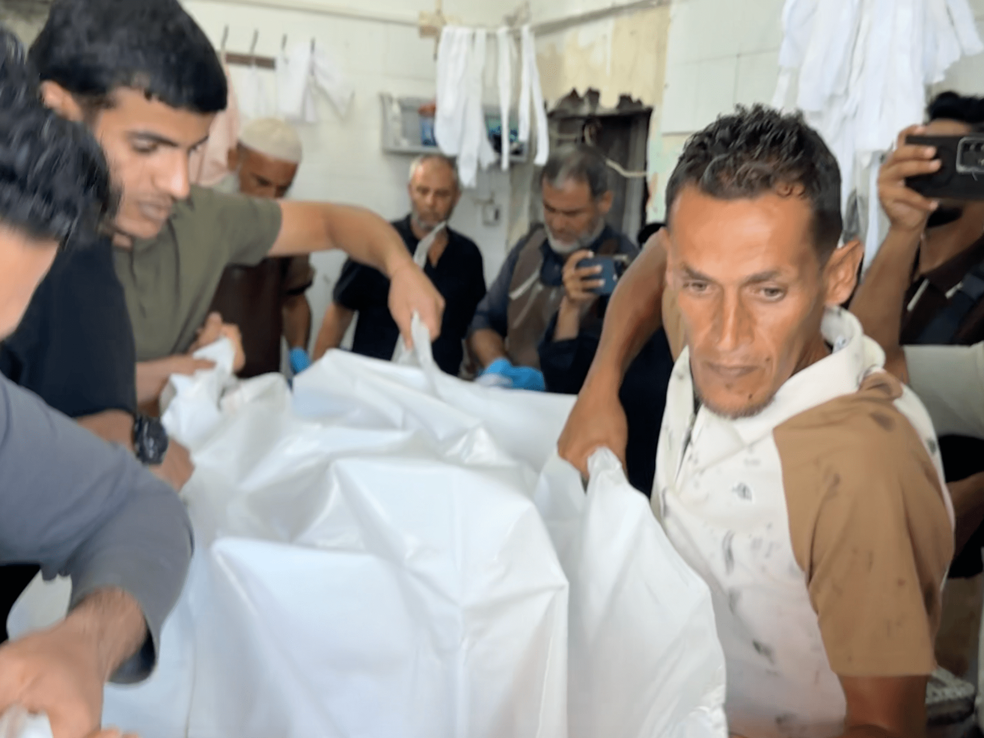 Gaza bids farewell to slain journalist Ahmed Wishah