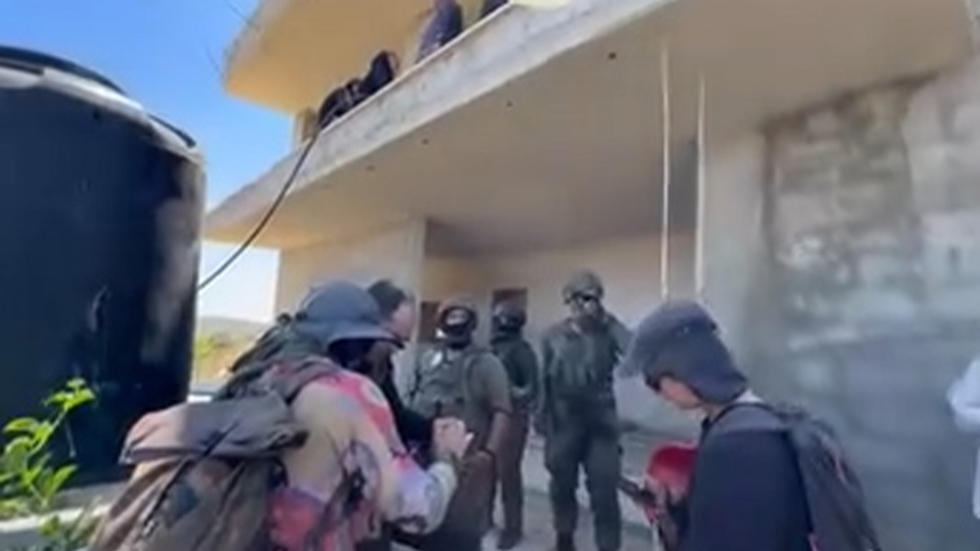 Videos show Israeli settlers trying to seize house in occupied West Bank