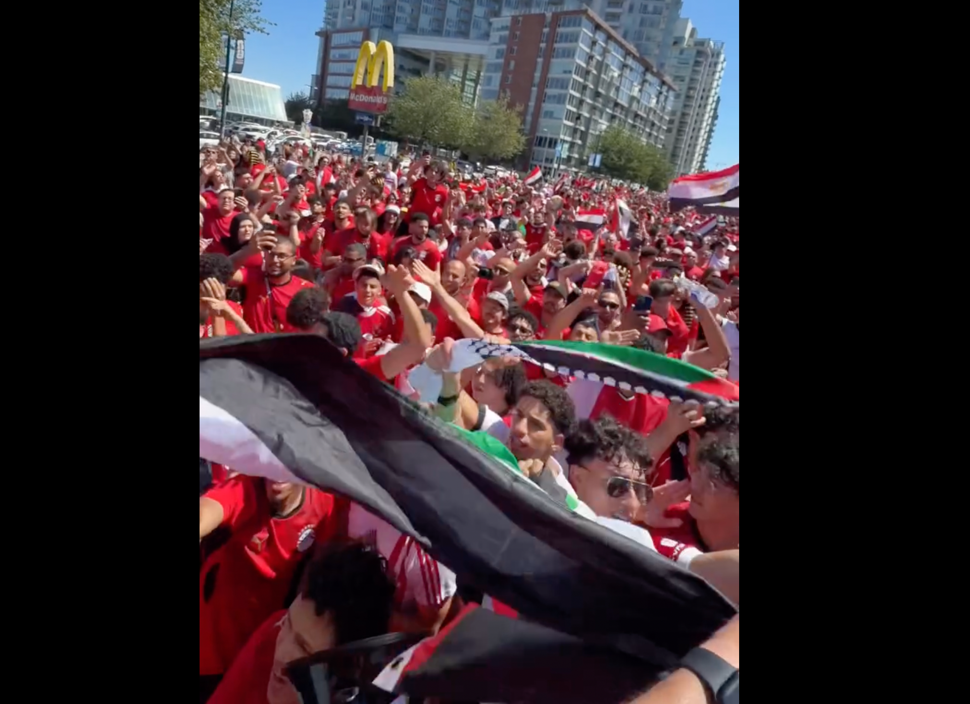 Egyptian football fans chant for Palestine in Vancouver