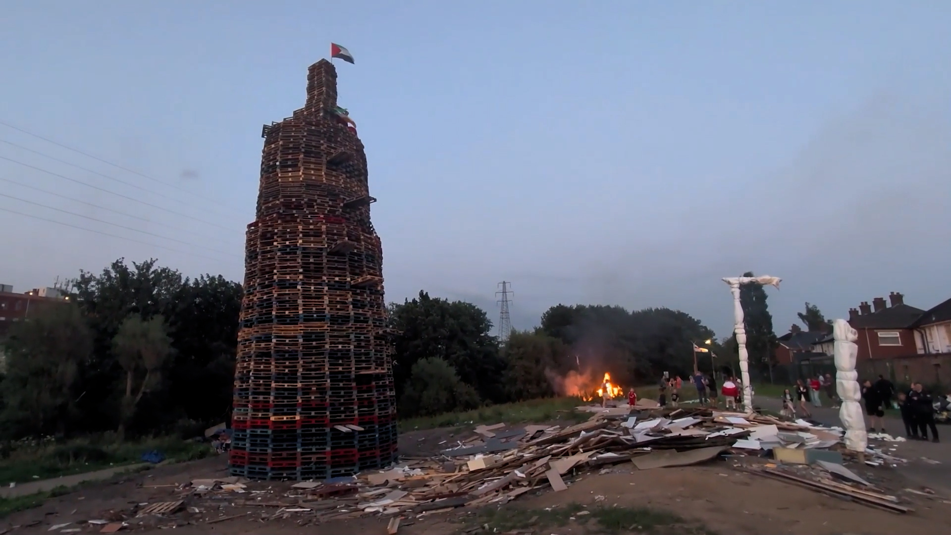 Anti-migrant display set alight in Northern Ireland bonfire