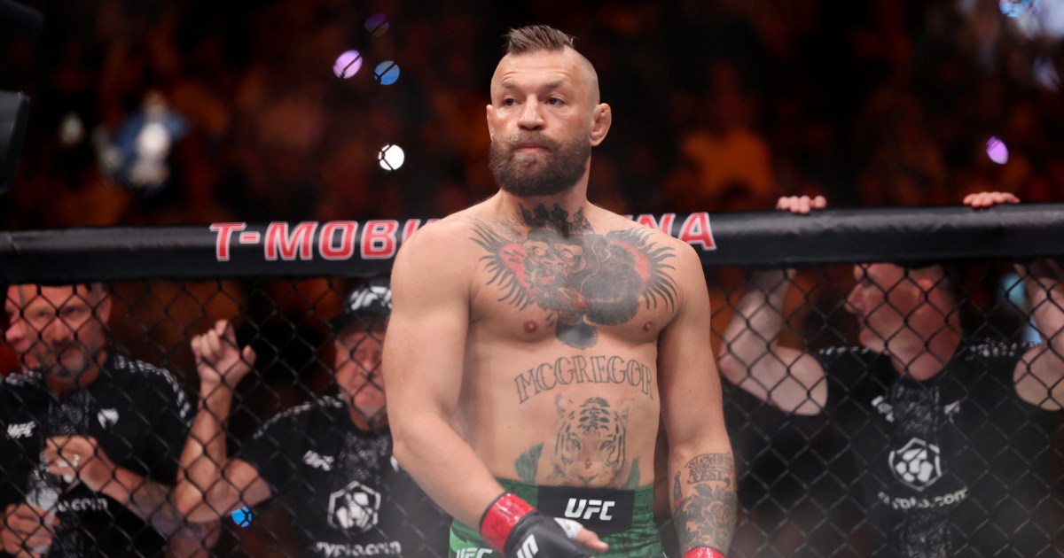 Injured Conor McGregor’s UFC comeback ends in defeat to Max Holloway