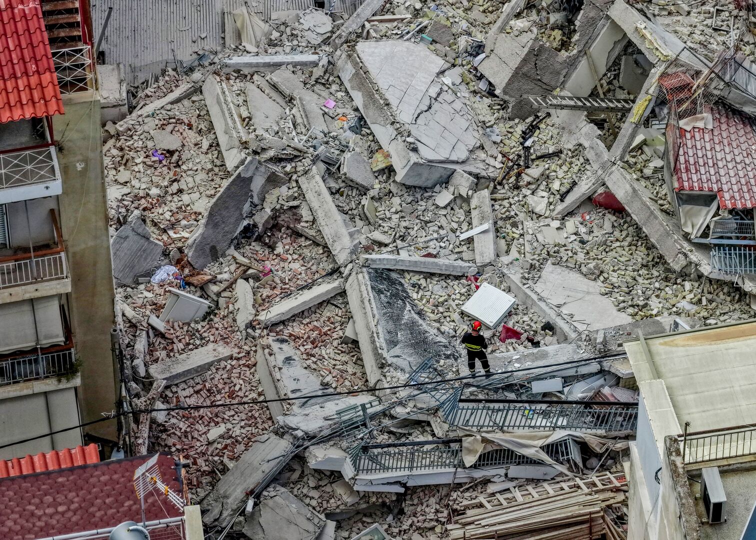 Emergency crews search rubble after Athens building collapse