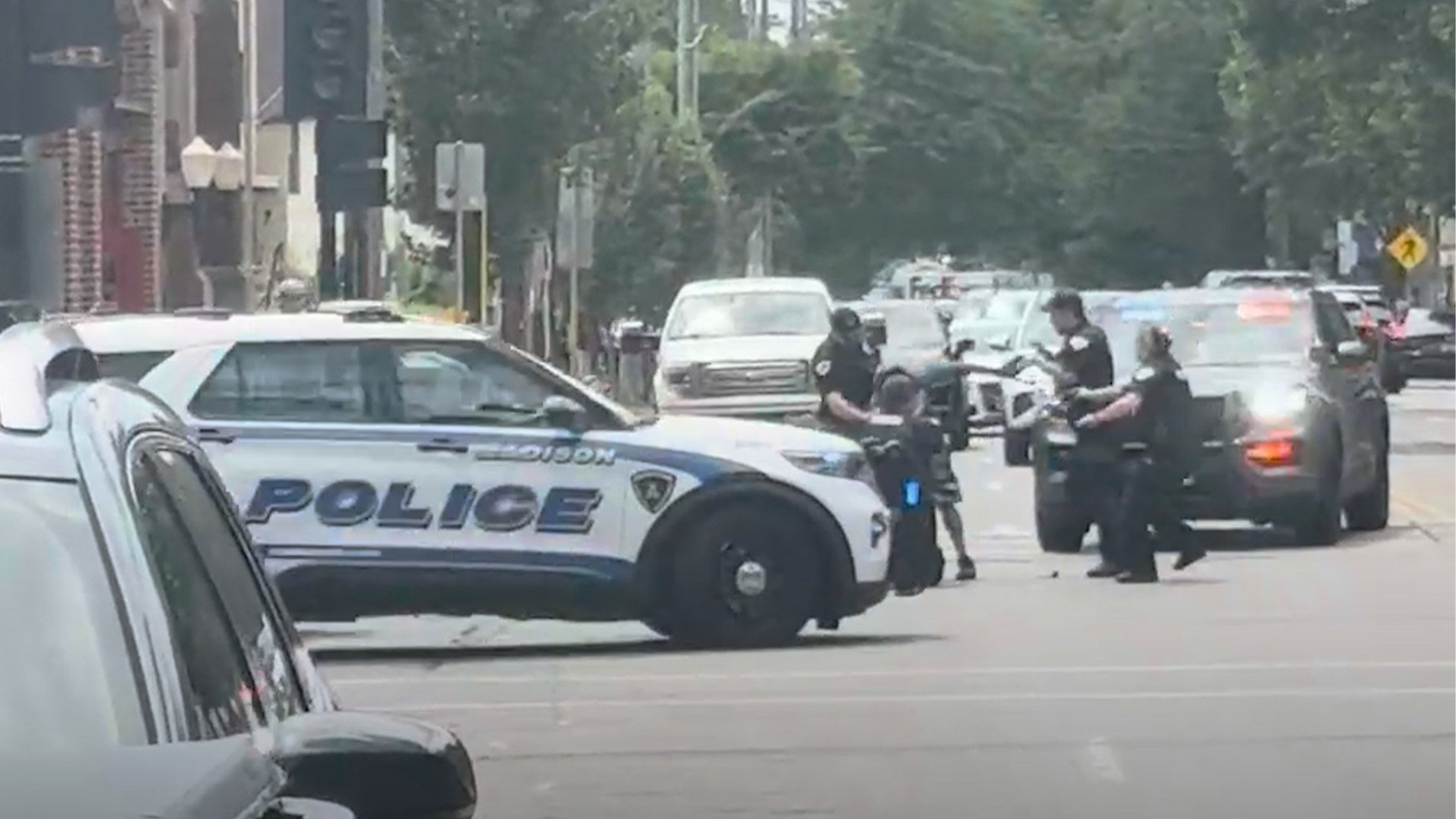 Videos show the moment police officer shoots man on street in Wisconsin