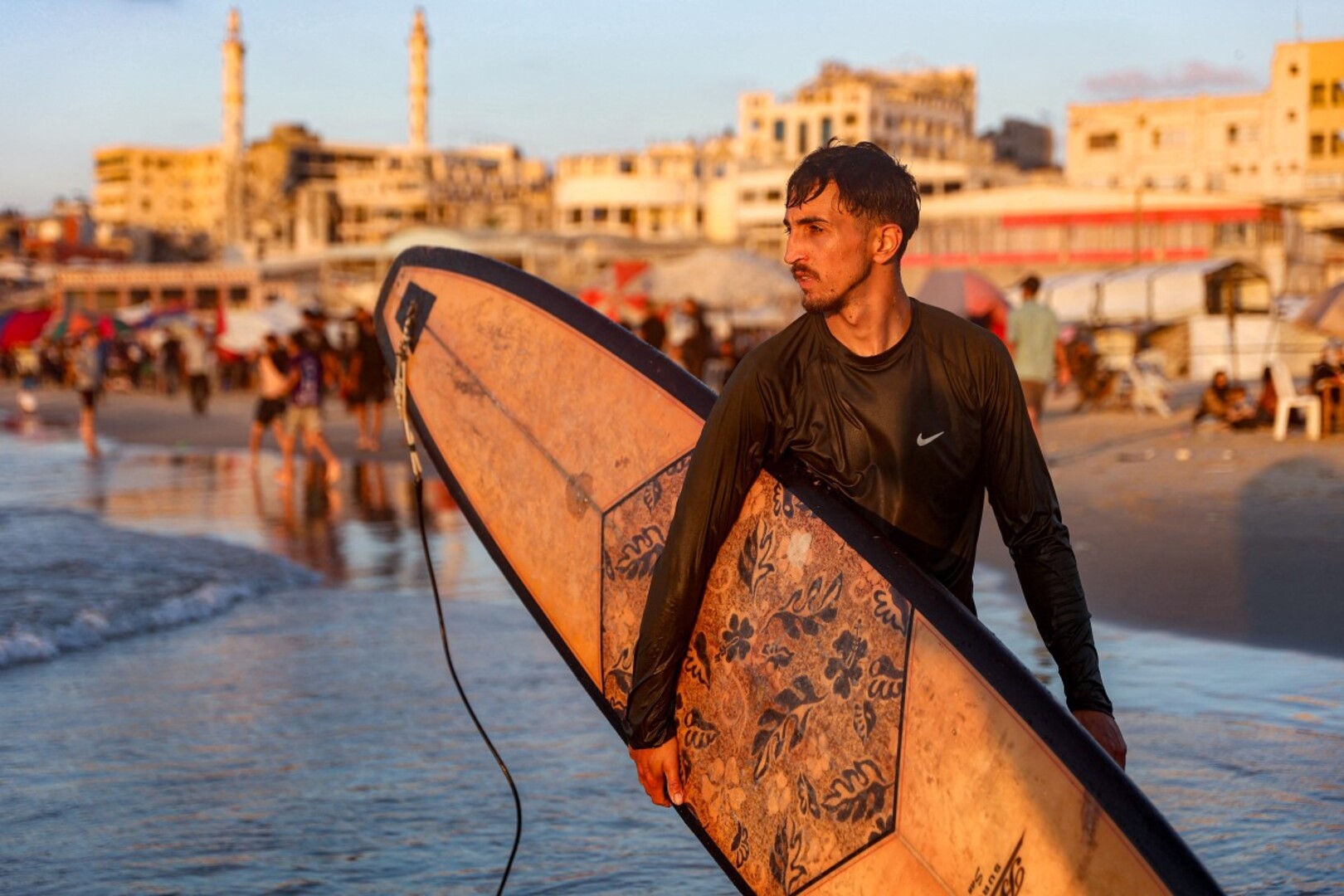 Gaza surfers seek solace from war in the sea