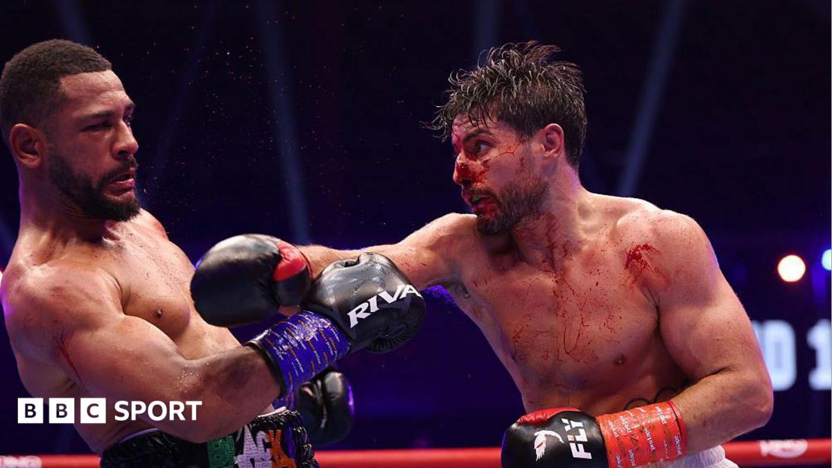 Bloodied Kelly battles past Agyarko to retain title