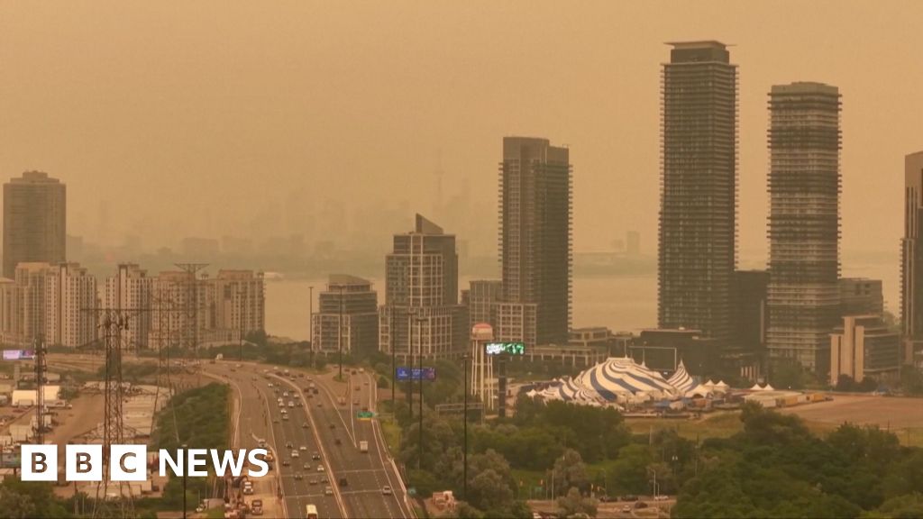Orange haze from Canada wildfires seen in Ontario and northern US