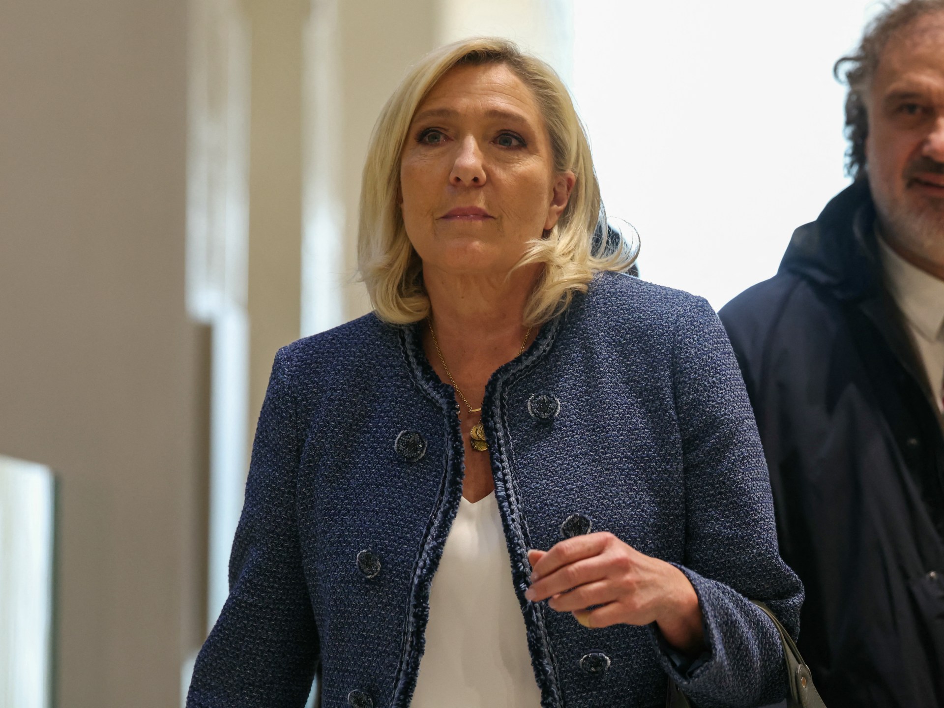 France appeals court opens door for Le Pen presidential run, with ankle tag