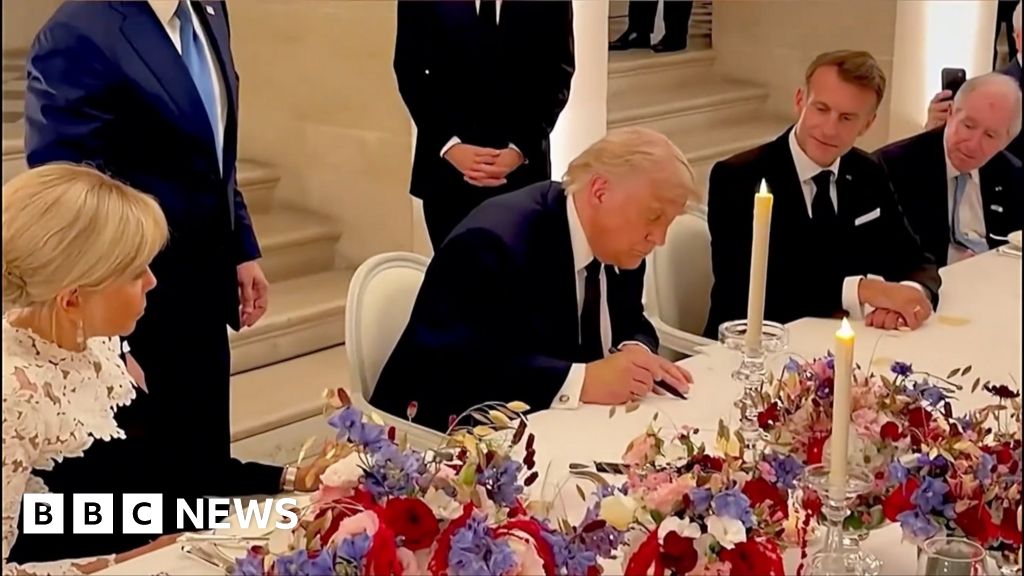 Moment Trump signs US-Iran agreement at Palace of Versailles