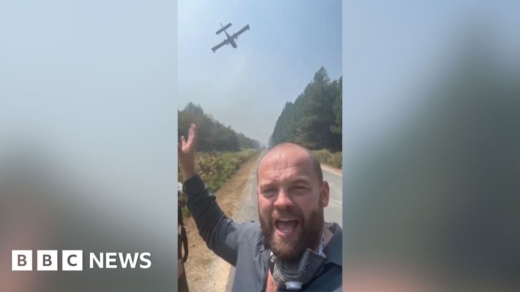 Planes dump water on French wildfires as temperatures rise