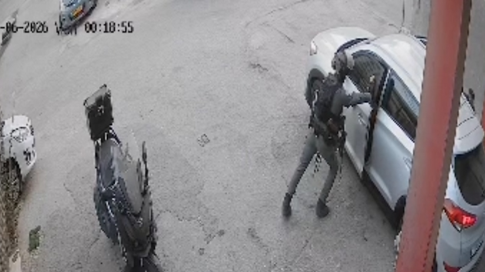 Moment Israeli soldier hurls stun grenade into Palestinians’ car