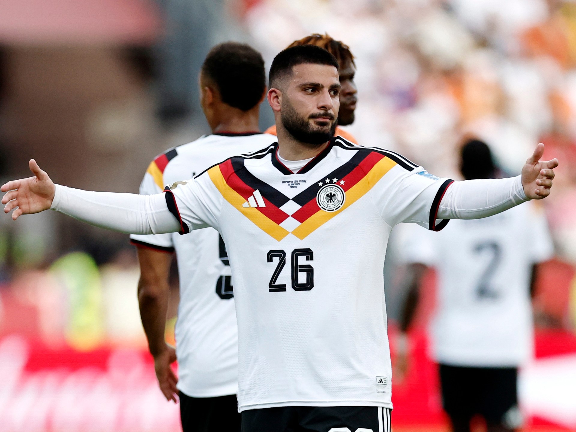 Undav injury-time goal sees Germany beat Ivory Coast to top World Cup group
