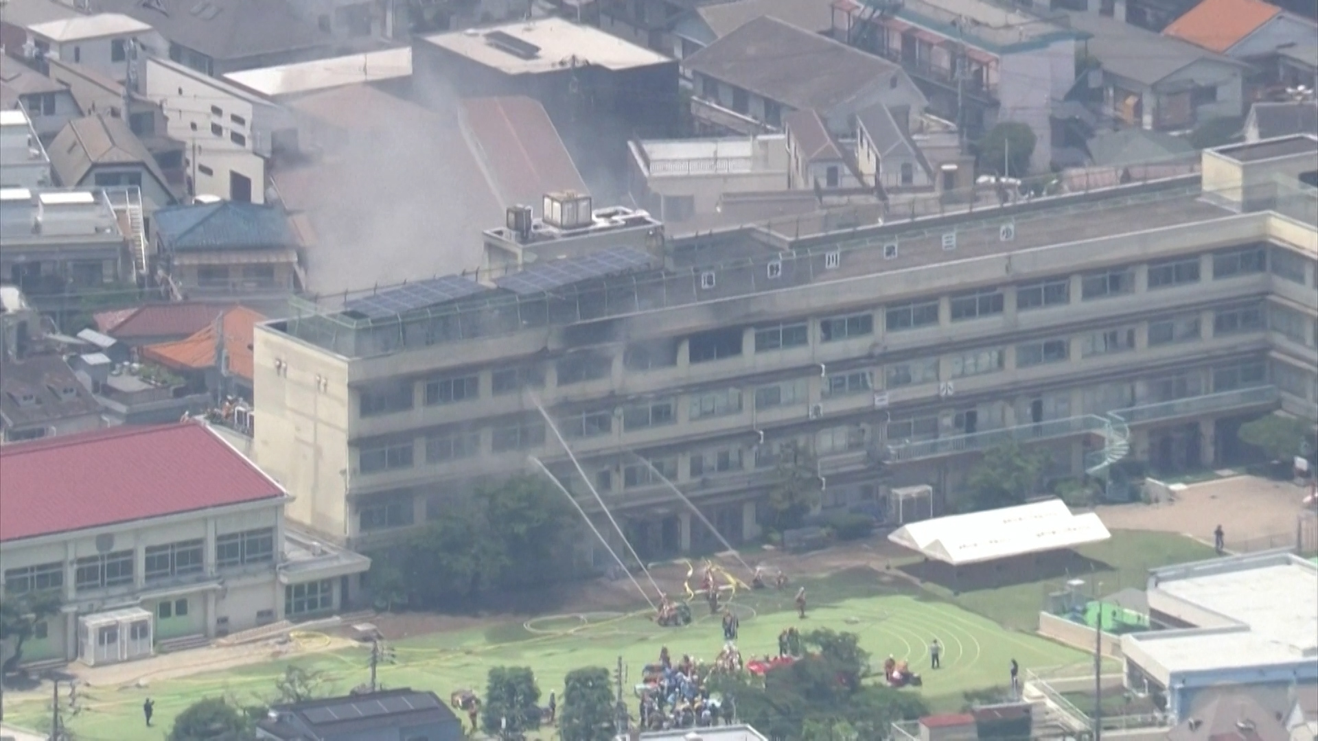 Dramatic rescue as fire rips through school in Japan