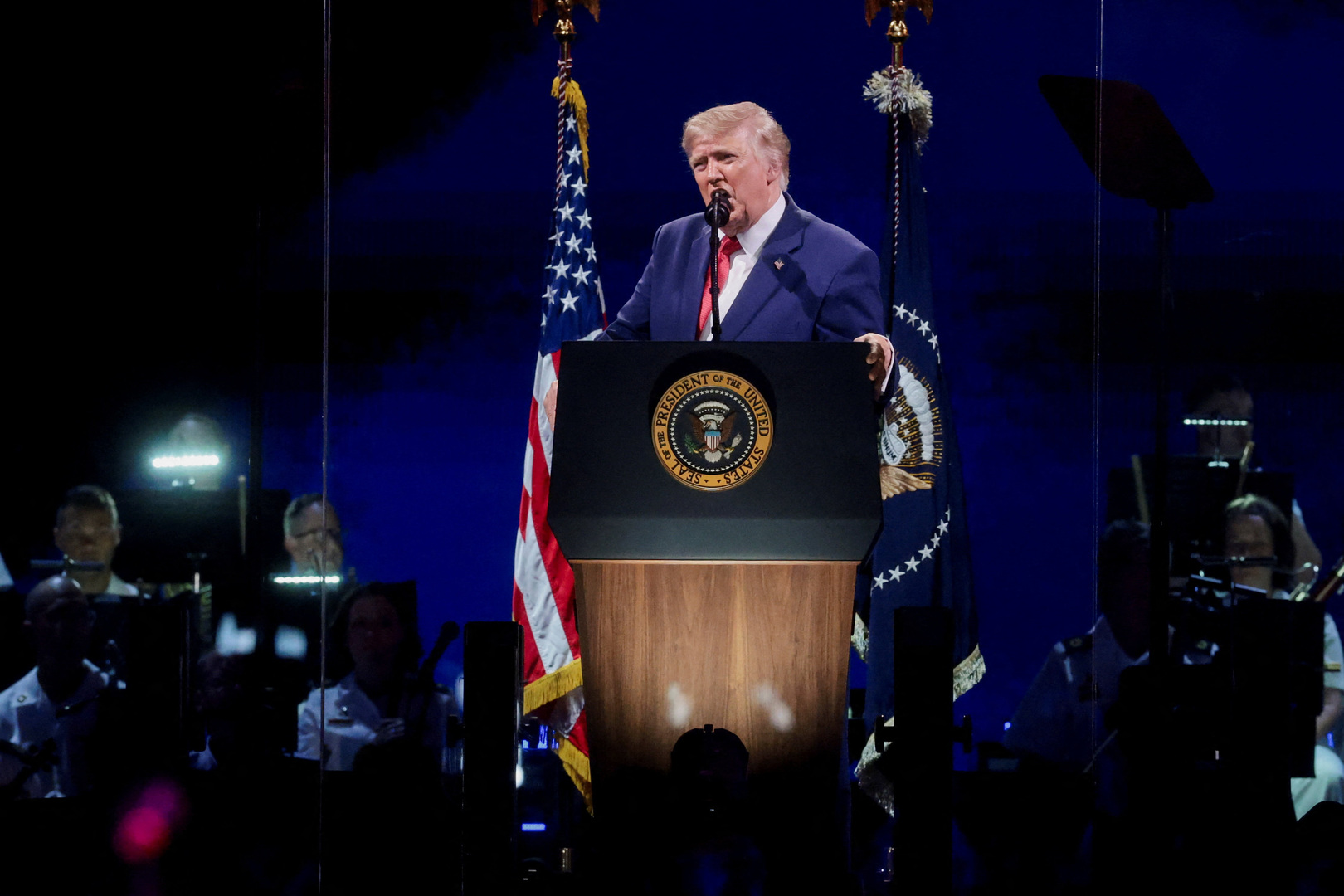 Trump lauds Americans in storm-delayed 250th anniversary speech