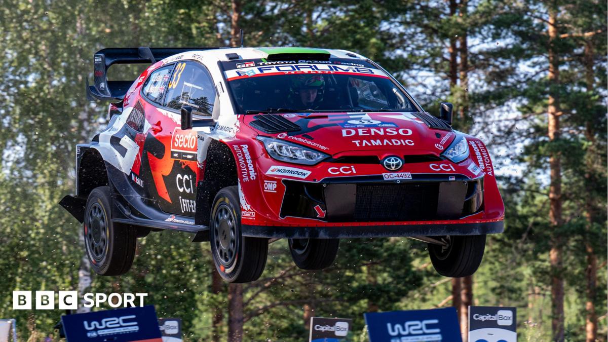 Evans third after roll as Ogier taken to hospital