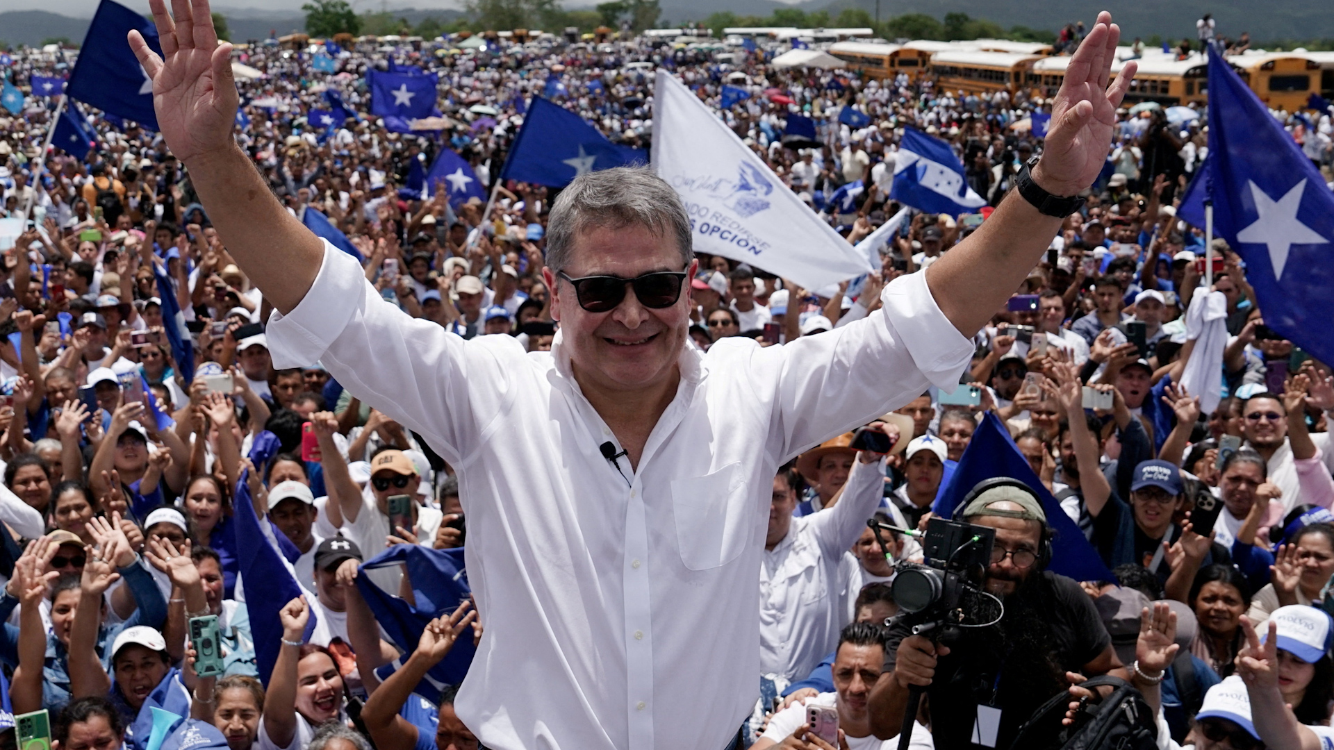 Former Honduras president returns home after Trump pardon