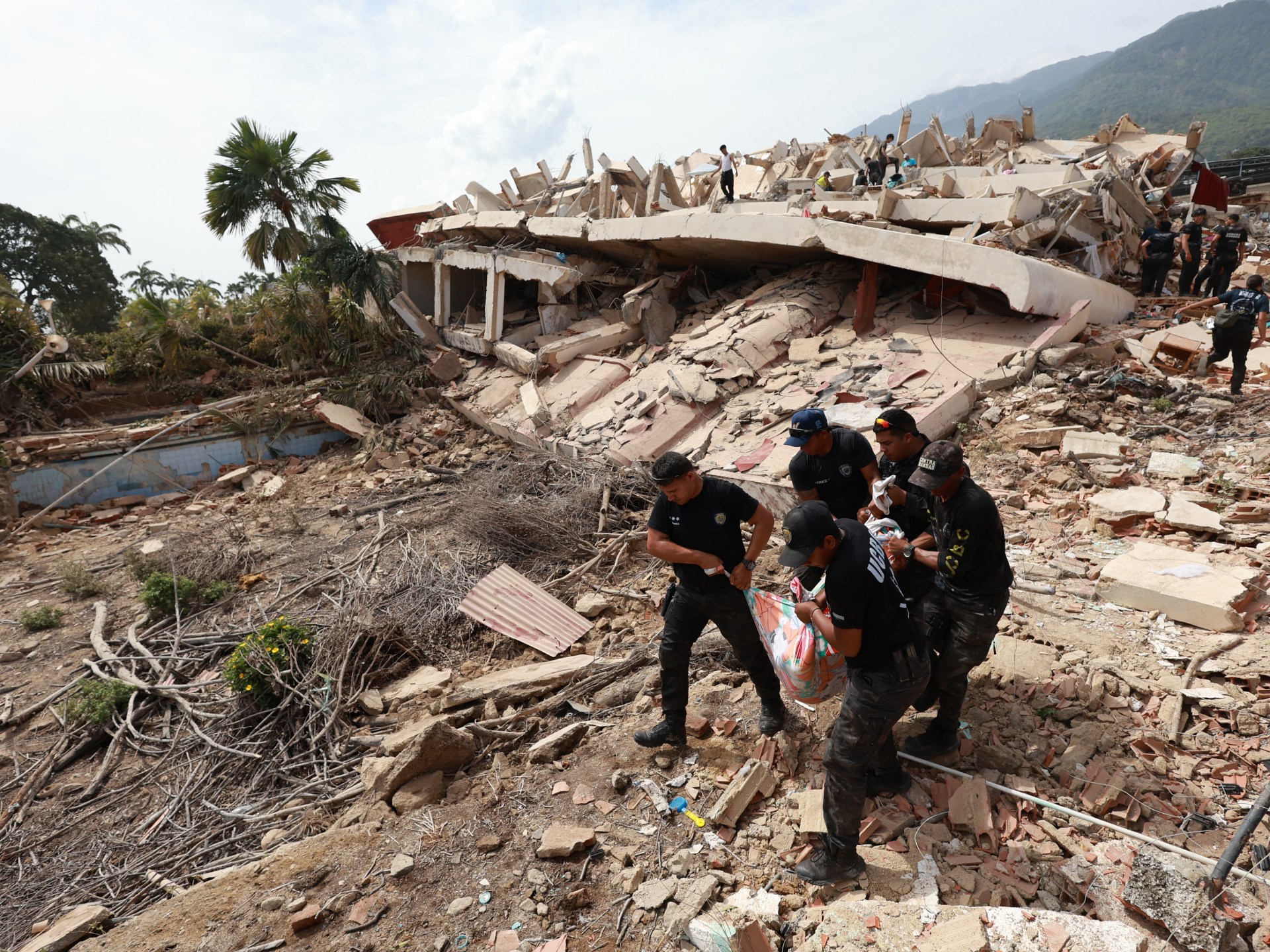 Hundreds trapped beneath buildings a day after Venezuela’s twin earthquakes